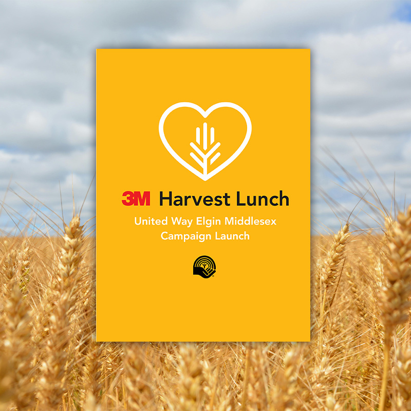 Wheat field background with a yellow box promoting the 3M Harvest lunch for 2025.