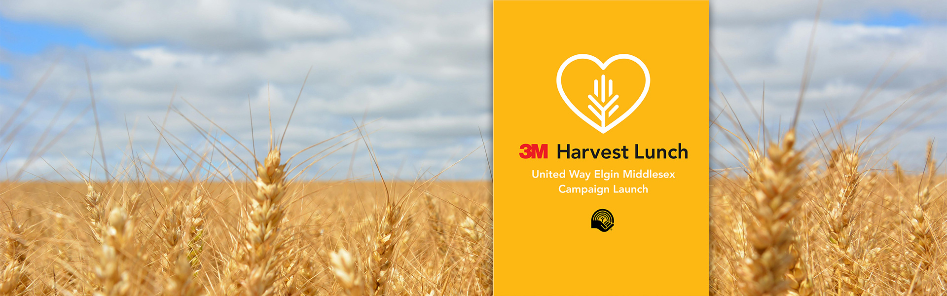 Wheat field background with a yellow box promoting the 3M Harvest lunch for 2025.