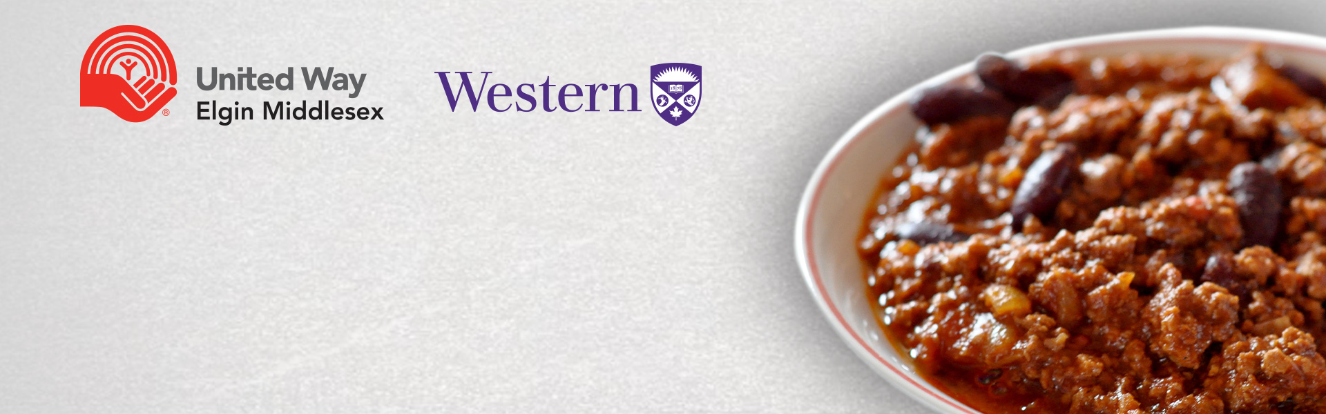 Warm bowls of chili on a white background.